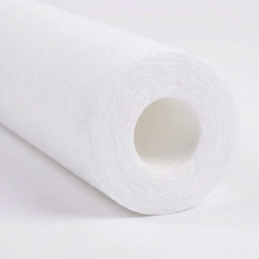 Close-up of the 10 inch 5 micron melt-blown sediment cartridge, fibrous surface and open core