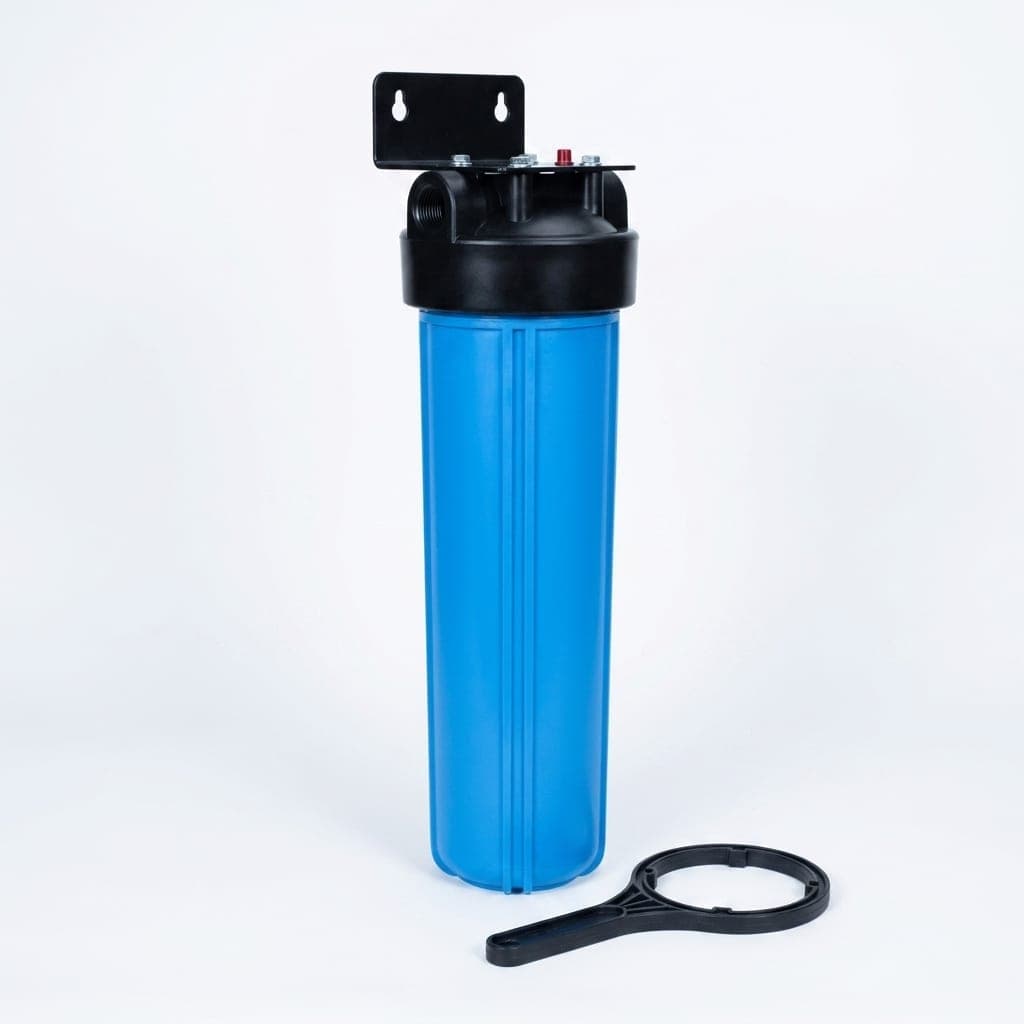 20 inch Big Blue housing on a white wall bracket with the housing spanner