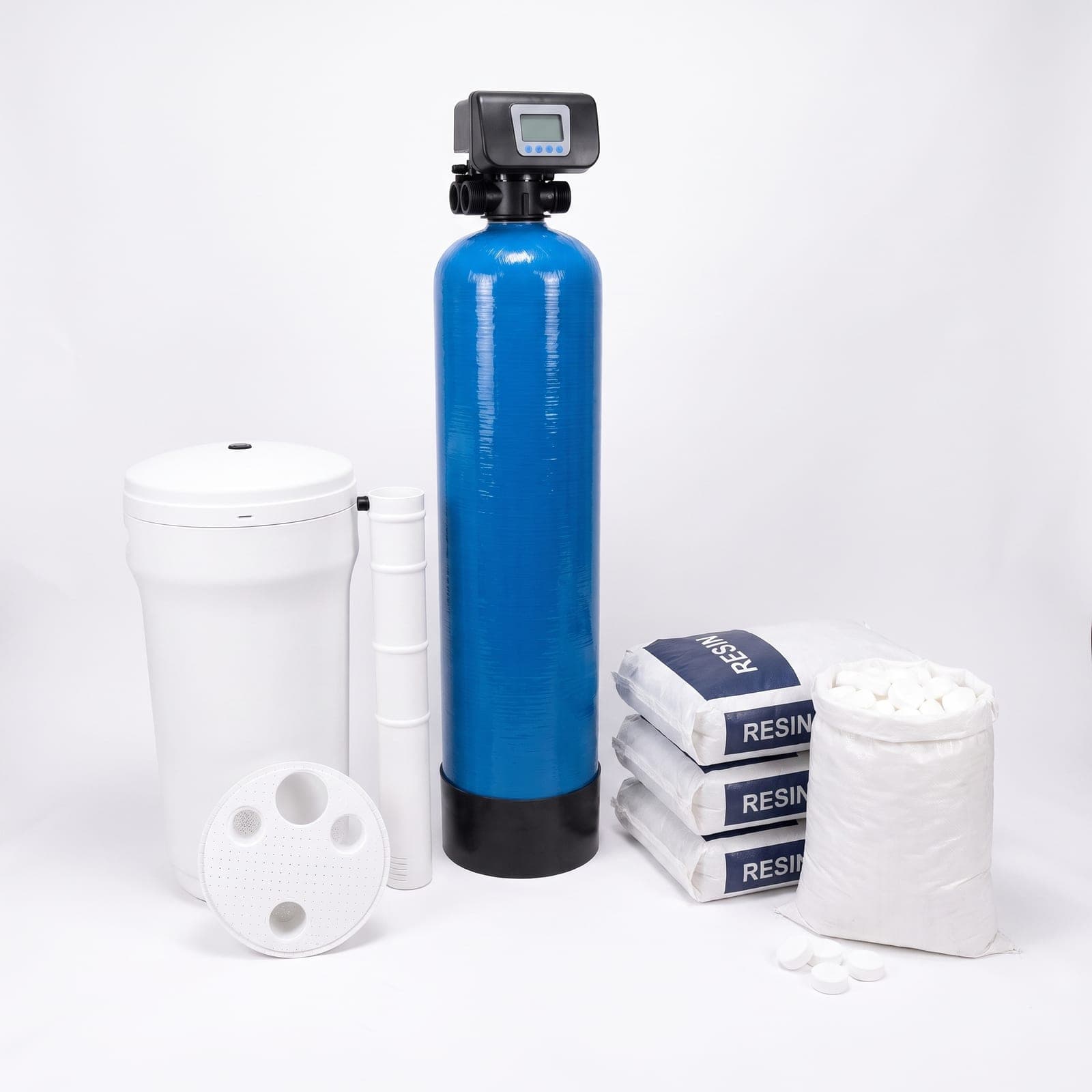 Water softener kit: 75 litre vessel with the automatic softener valve fitted, the round brine tank, three bags of resin and a bag of salt tablets