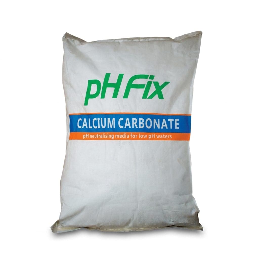 Open bag of calcite pH correction media with a heap of white granules