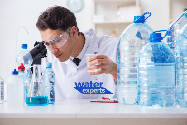 Scientist performing a comprehensive borehole water testing